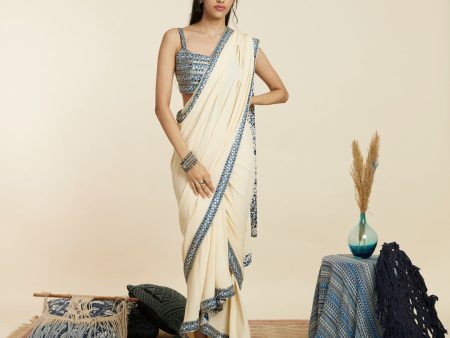 BEIGE CASCADE SAREE PAIRED WITH EMBELLISHED BUSTIER Online